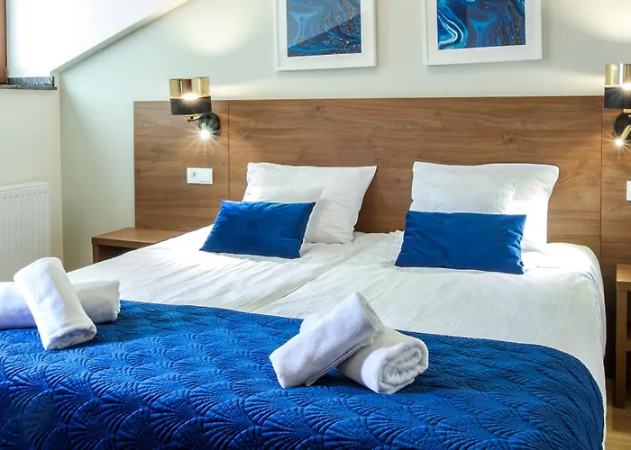 Aparthotel Portal House 4*